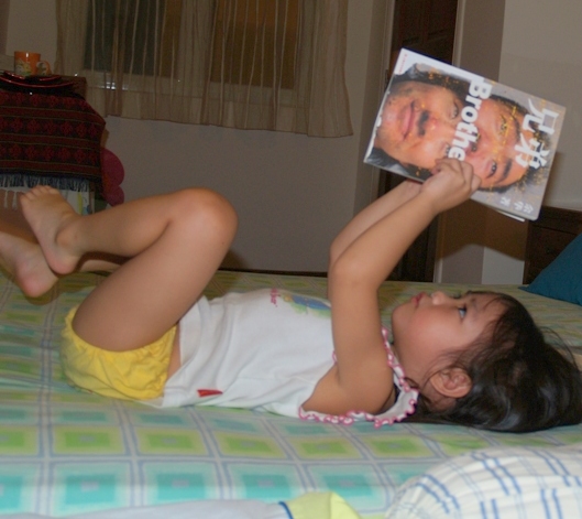 Zara checking out my book