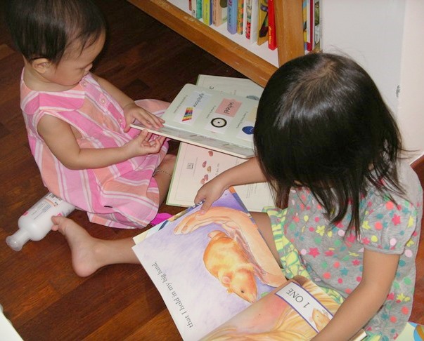 Girls reading together