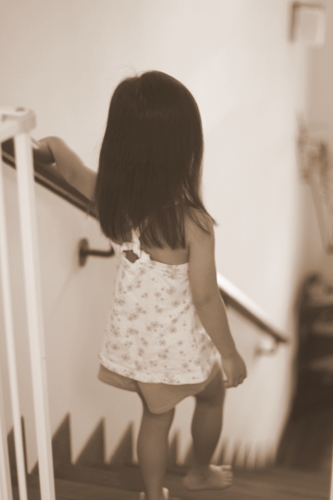 Zara walking down the stairs