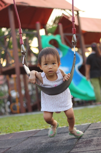Zaria swinging on her own