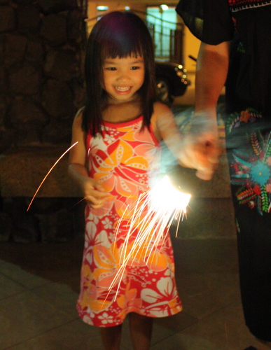 Zara playing with sparkles