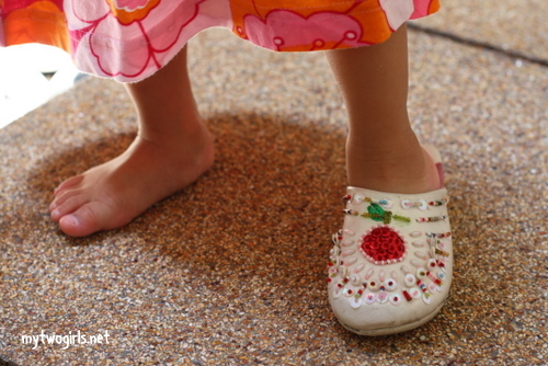 Zaria wearing the left side of the Click Clock Shoes