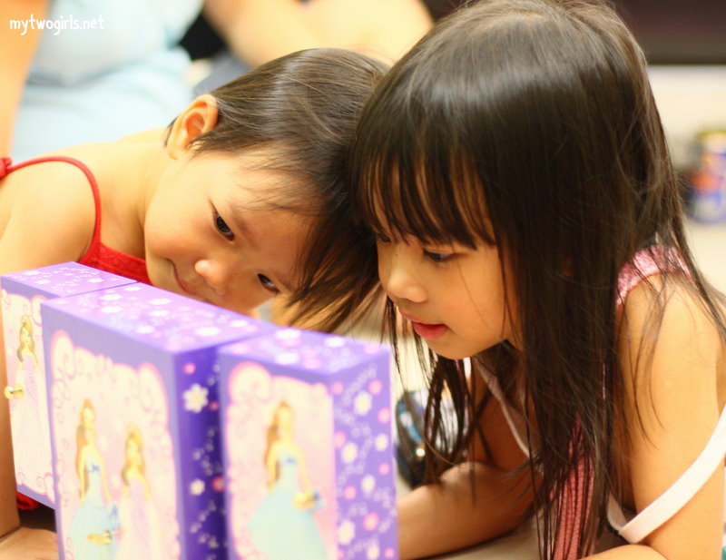 Zara & Zaria checking out Zara's favourite present