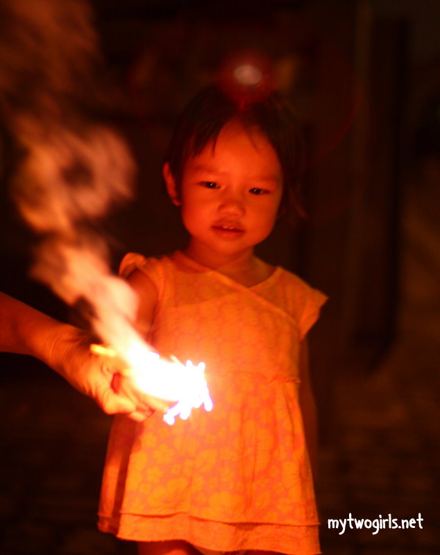 Zaria playing with sparkler