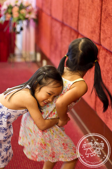 Girls playing at the stage of a restaurant